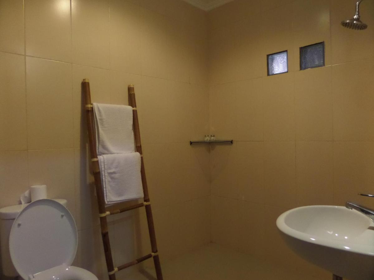 Mansu Hotel And Spa Legian Kuta Lombok Habitación foto